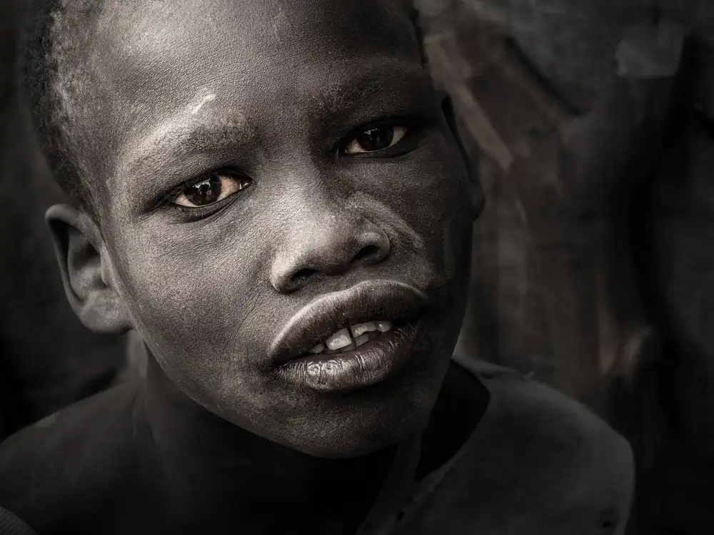 Molina, Elena: bambino mundari