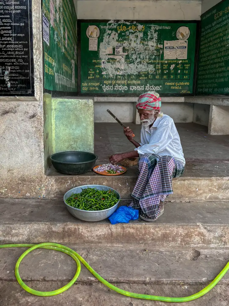 Lam, Ilana: making  food in bus  station