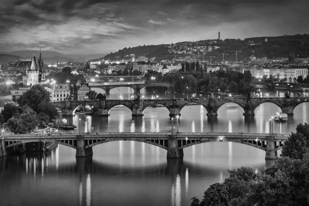Viola, Melanie: Evening view over the Vltava bridges in Prague - Monochrome