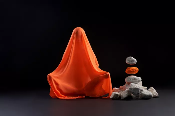 Guryanov, Andrey: Anonymous female in transparent veil sitting on the floor and making rock levitate