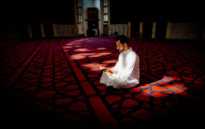 Ras, Abu Ali: Reading Quran