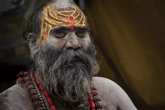 Molina, Elena: Naga sadhu on the banks of the holy Ganges River