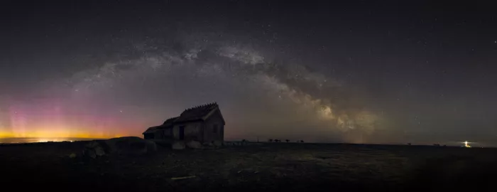 Renmyr, Magnus: Milky way, aurora and a lighthouse together with the old fishermans huts