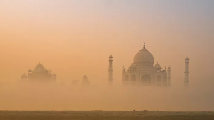 Chawla, Shobhit: The Taj Mahal rises in winter fog.