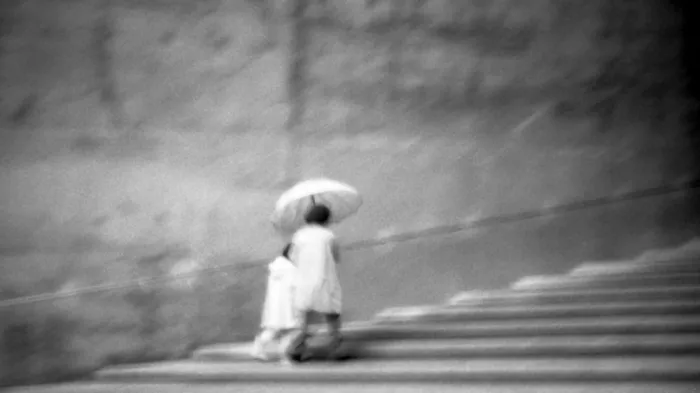 Kim, Parole: Steps Through the Rain
