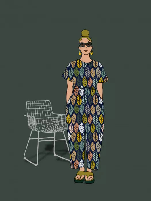 Annick: Confident, stylish woman dark green